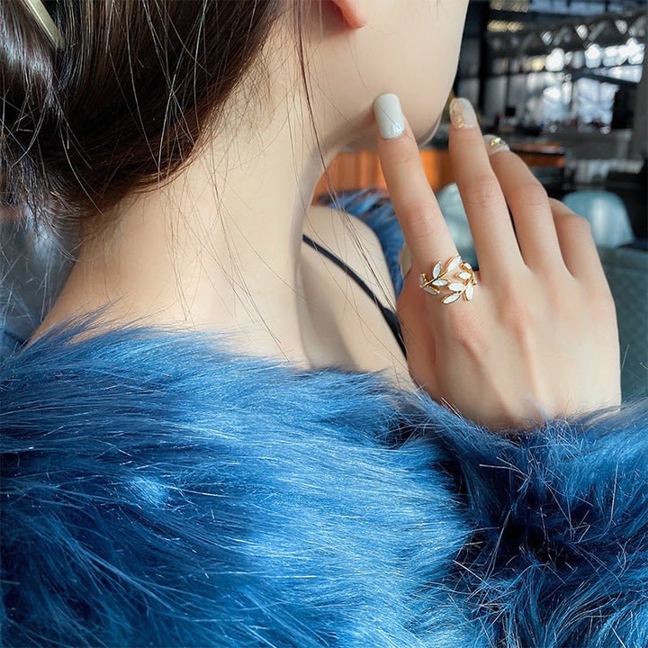 Adjustable Gold Leaf Ring Featuring White Opal